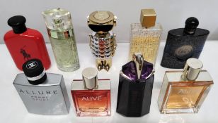 Thirty perfumes/testers and related to include Lancome, Mugler, Chanel, Boss and more! (please note: