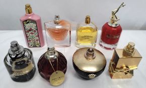 Thirty perfumes/testers and related to include Jean Paul Gaultier, Armani, YSL, Versace and more! (p