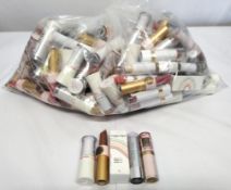 Approximately fifty various brands of lipsticks, various colour shades to include Magic lips, Lipsta