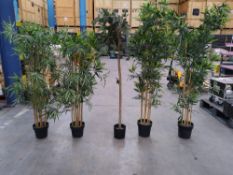 Five assorted preowned fake bamboo plants, in weighted plant pots.