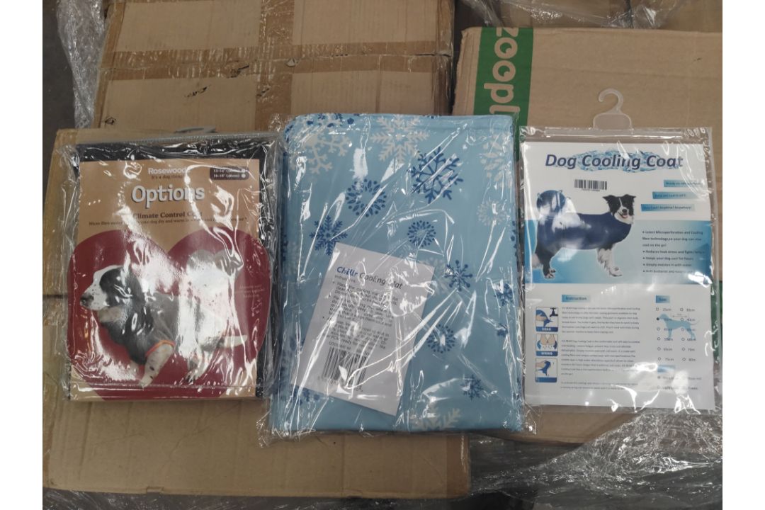 Pallet of assorted pet products including Dog Cooling Mat, Climate Control Coat and more. - Image 1 of 2