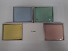 One pallet containing 1000+as new Teddie vegan leather bifold wallets in four assorted colours, gift