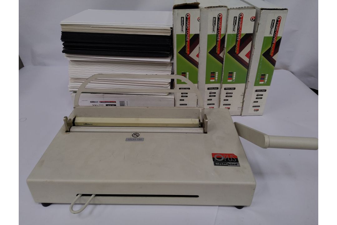 Preowned Opus Atlas 150 Metalbind bookbinding machine, plus a box of assorted unused accessories. - Image 1 of 4