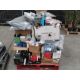 A pallet of assorted auto parts and related products. - Image 1 of 2