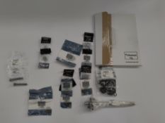As new bundle of fourteen Triumph motorbike spare parts; 2x T1130245, 3x T1130247, 2x T1130250, 2x T