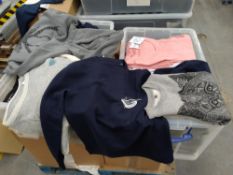Nine boxes of assorted illustrate clothing, various designs, various sizes.