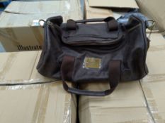Four boxes of as new illustrate Duffle bags, vegan leather, brown. Approximately 48 bags in total.