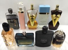 Thirty perfumes/testers and related to include Dolce & Gabbana, Gucci, Jean Paul Gaultier, Armani an
