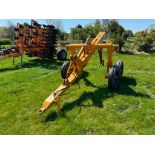 2001 Michael Moore Hi-Rider single leg trailed mole plough on 7.5-16 wheels and tyres. Serial No: 20