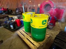 Quantity John Deere Hy-Gard oil barrels with manual pump