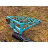 Cook flat 10 bale grab with Manitou attachments. Serial No: 1897003