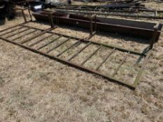 Metal feed barrier section and trough
