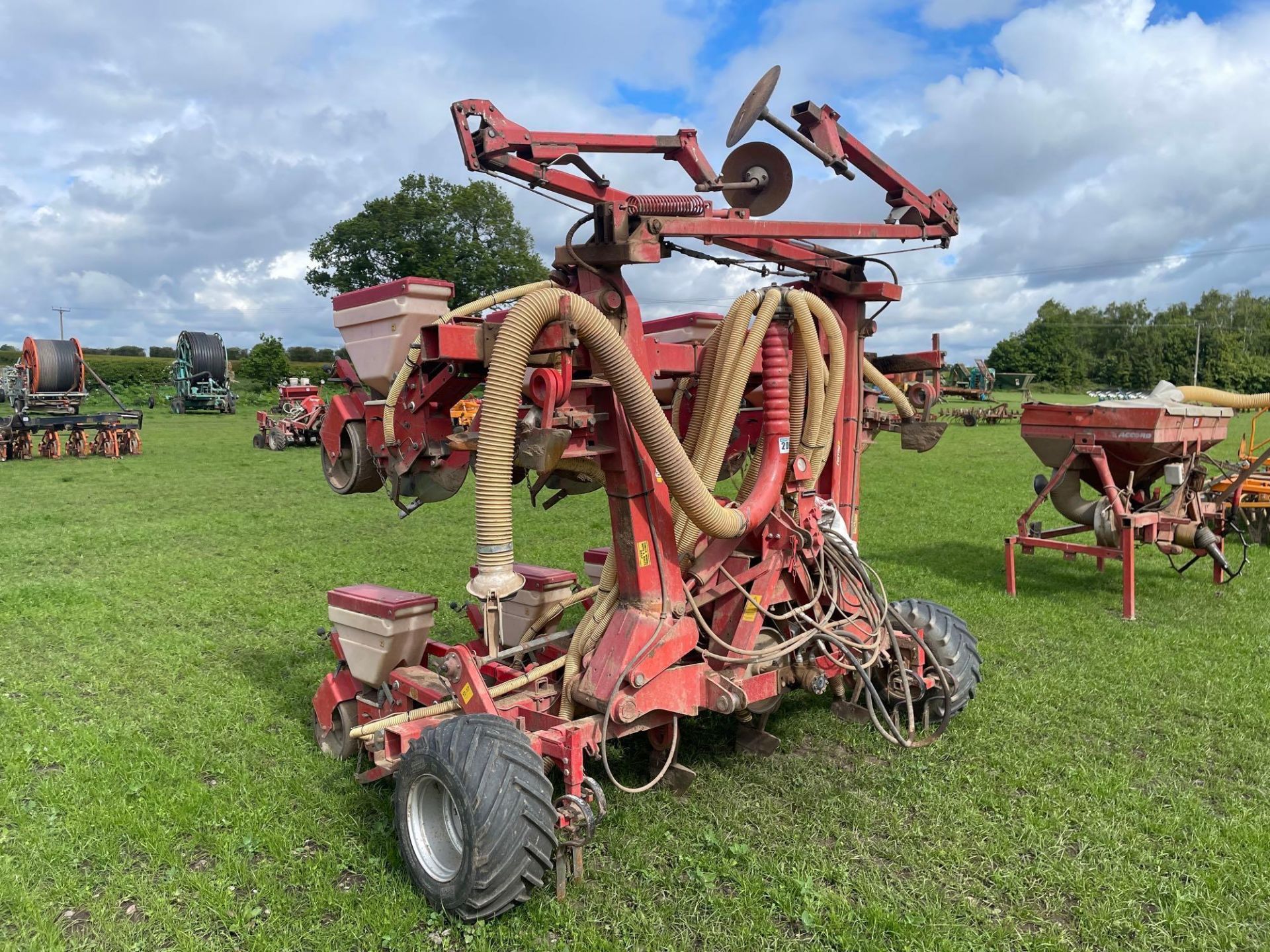 Accord Optima 8 row maize drill with bout markers and wheel track eradicators, hydraulic folding. Se
