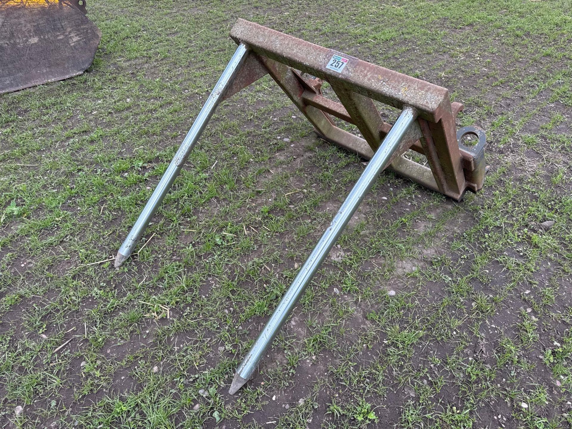 Bag lifter with pin and cone attachments