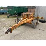 Simba trailed toolbar with twin leg subsoiler, hydraulic operated.