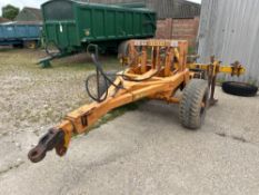 Simba trailed toolbar with twin leg subsoiler, hydraulic operated.