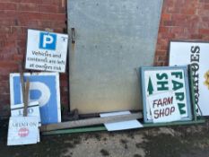 Parking and farm shop signs