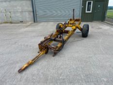 Michael Moore single leg trailed mole plough on 11.5/80-15.0 wheels and tyres. Serial No: 217