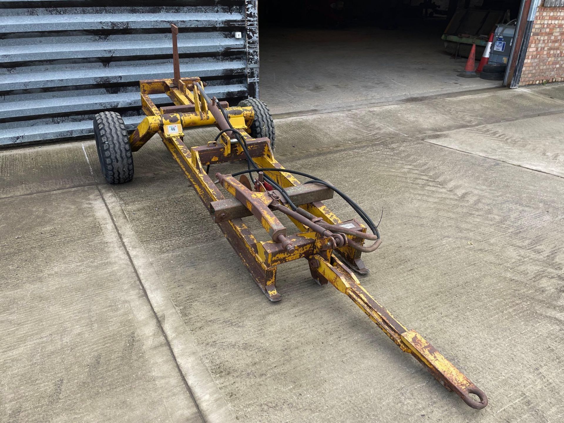 Michael Moore single leg trailed mole plough on 11.5/80-15.0 wheels and tyres. Serial No: 217