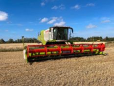 2015 Claas Lexion 750 APS Hybrid combine harvester with Claas Vario 930 header on 25" Terratrac fron