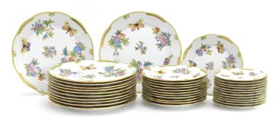 A Herend Hungary 'Queen Victoria' pattern dinner service, hand painted, comprising twelve dinner