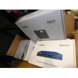 4 x Wildix w-air office phones, 1 x Wildix W02FXS analog media gateway poe module, 3 x W-Air sync