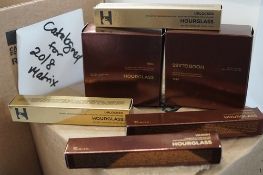 2 x 10.5g tubs of Hourglass veil translucent powder, 2 x 6ml applicators of Hourglass concealer,