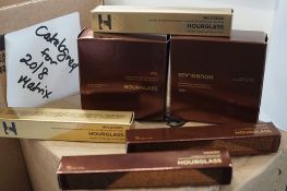 2 x 10.5g tubs of Hourglass veil translucent powder, 2 x 6ml applicators of Hourglass concealer,