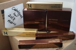 2 x 10.5g tubs of Hourglass veil translucent powder, 2 x 6ml applicators of Hourglass concealer,