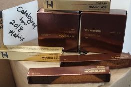 2 x 10.5g tubs of Hourglass veil translucent powder, 2 x 6ml applicators of Hourglass concealer,
