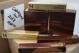 2 x 10.5g tubs of Hourglass veil translucent powder, 2 x 6ml applicators of Hourglass concealer,