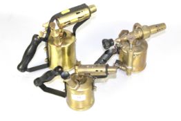 Three brass blow lamps; to include a rare Bladon of Birmingham special lamp