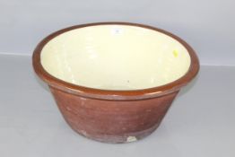 A large 19th Century glazed dairy bowl