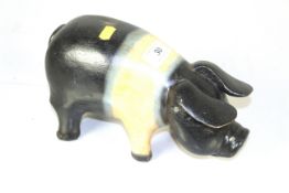 A small butchers advertising display pig