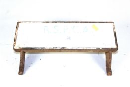 A small RSPCA cast iron feed trough