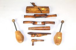 A collection of antique treen; including carpenters planes, shaves, barrel spigot etc.