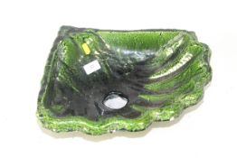 A small French green glazed corner sink