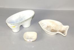 Three 19th Century jelly moulds, including the British Lion blamanch and jelly mould