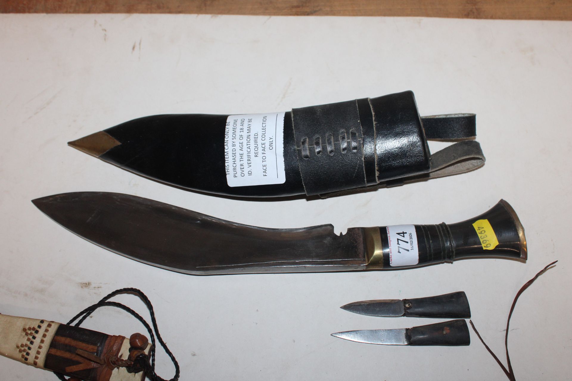 A Kukri knife together with a leather handled dagg - Image 9 of 13