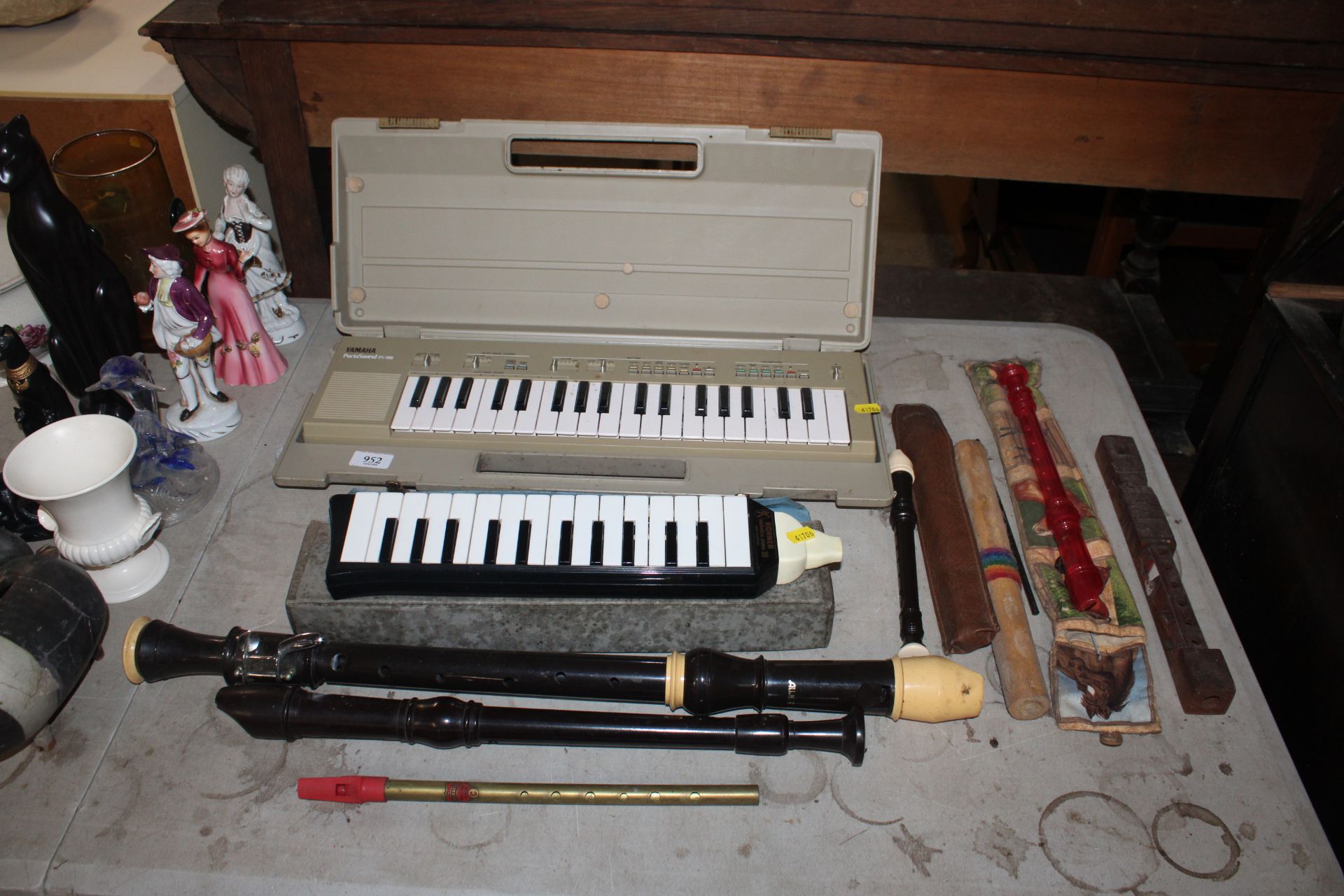 A Yamaha Portasound PS-300, a Hohner Melodica pian