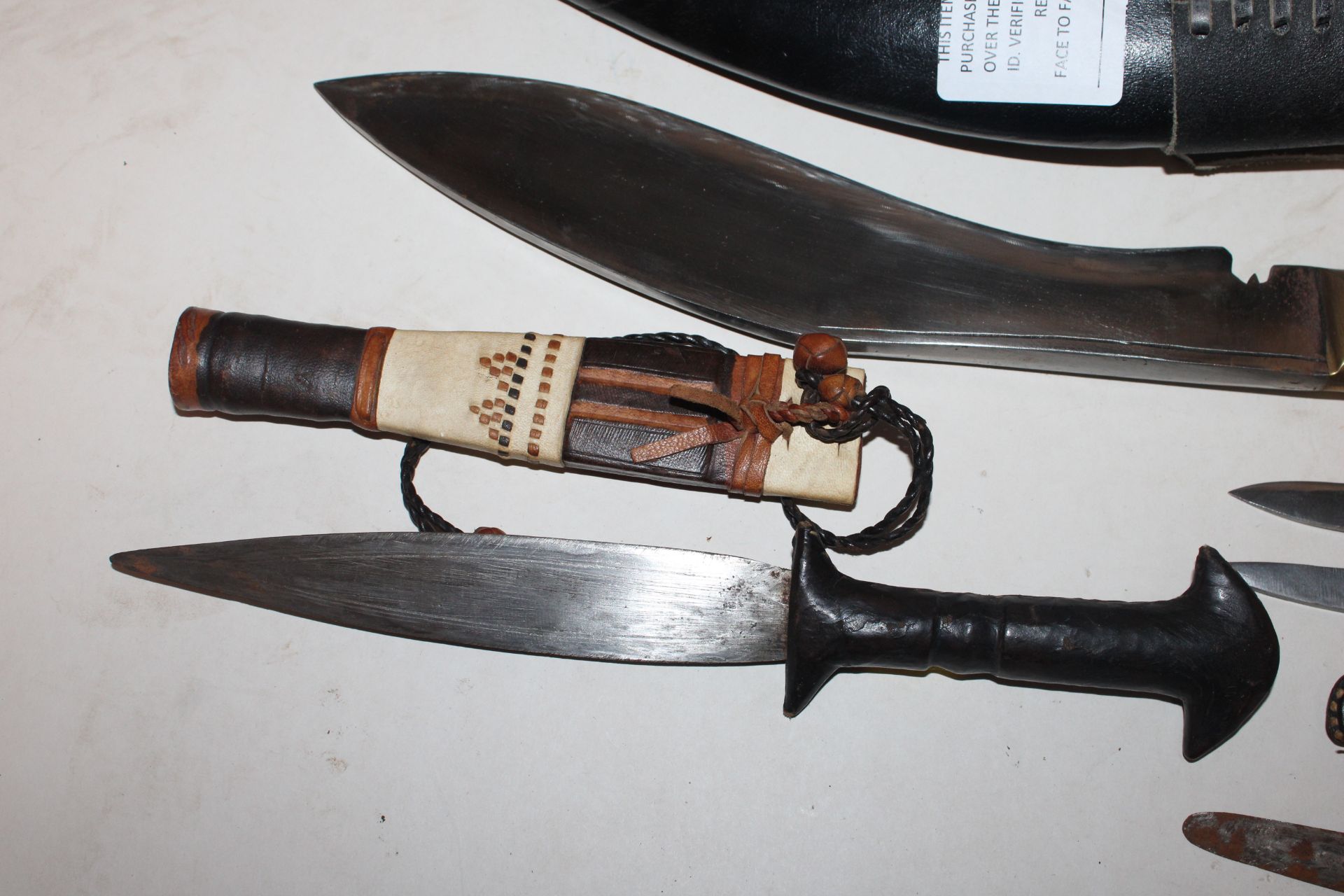 A Kukri knife together with a leather handled dagg - Image 2 of 13