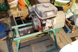 Petrol driven Christmas tree pointing machine.