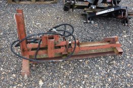 Linkage mounted hydraulic log splitter.