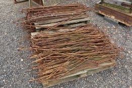 Large quantity of metal stakes.