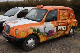 London International LTI TX II black cab. Registration LS06 NDU. Date of first registration 30/05/