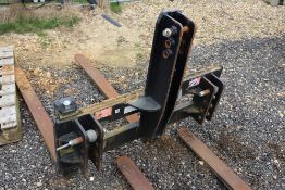 Cherry linkage mounted pallet tines.