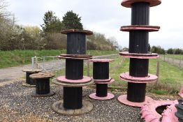 Cable drums, used as tables.