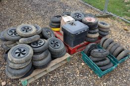 Large quantity of wheelbarrow wheels and tyres etc