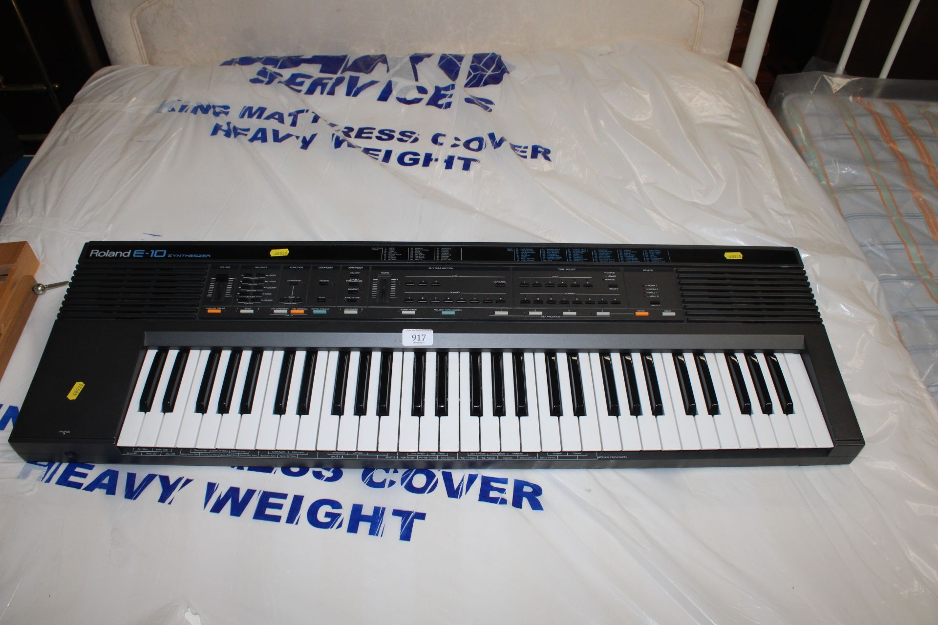 A Roland E-10 synthesiser electric keyboard lackin