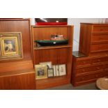 A G-plan open fronted bookcase with adjustable she